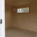 inred denna funkis stuga med compact living