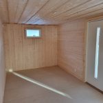 inred denna funkis stuga med compact living