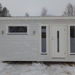 Bastu med bränd och borstad panel